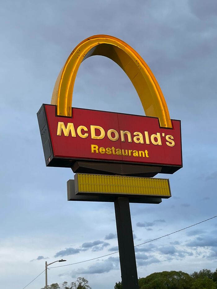 The McDonald's In My Town Has A Sign With Only One Arch