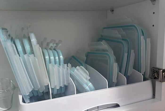 Stop Doing The Tupperware Shuffle Every Time You Open The Cabinet Thanks To This Genius Lid Organizer 