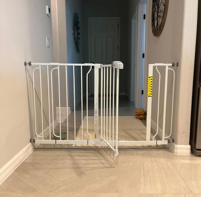 This Wide Walk Thru Baby Gate Is The Perfect Solution For Keeping Your Little Explorer Safe And Sound, While Still Giving You The Freedom To Move Around Your Home Without Feeling Like You're Navigating An Obstacle Course