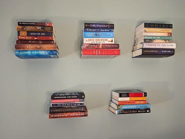 A Floating Bookshelf Will Make Your Books Look Like They're Defying Gravity, Turning Your Wall Into A Literary Wonderland