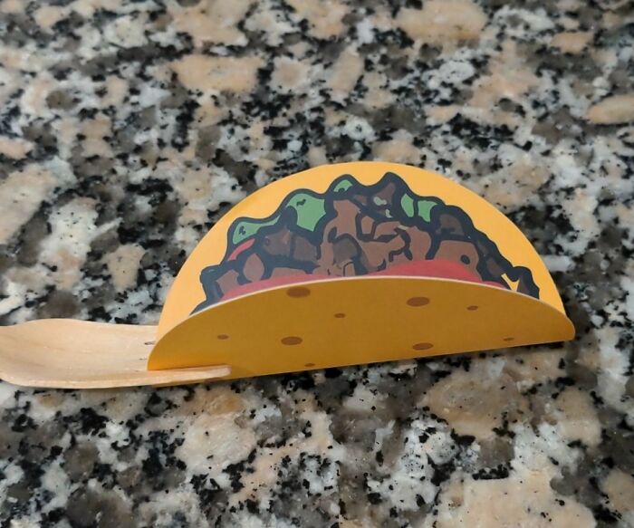 This Business Card For A Mexican Restaurant Shaped Like A Taco