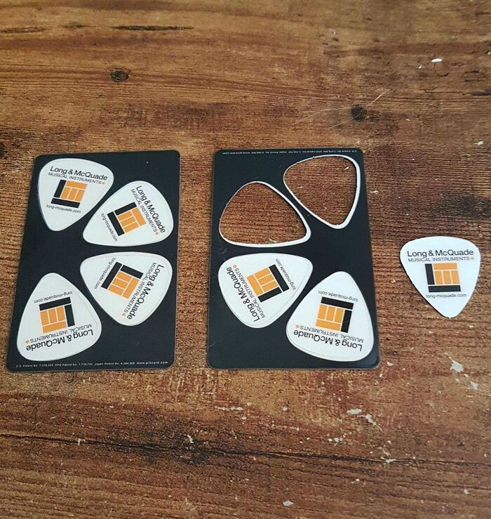 This Music Store's Business Cards Are Guitar Pics