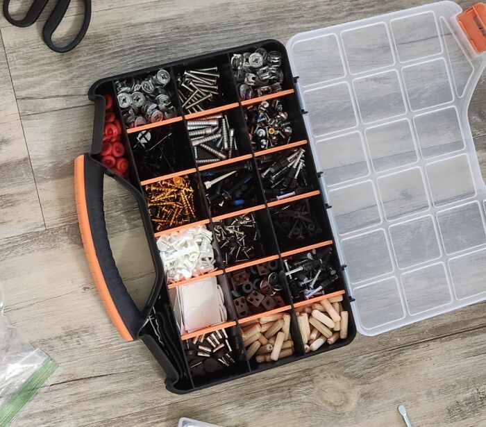 Repurpose a tool box to wrangle tiny treasures! Forget flimsy plastic bins. A sturdy and stylish toolbox is perfect for keeping those small toys, art supplies, and other odds and ends organized and contained. It's a practical and visually appealing storage solution that adds a touch of industrial chic to any space.