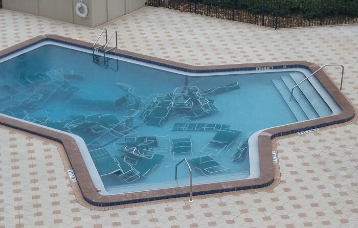 Prepping For Tropical Storm Colin: Placed The Chairs At The Bottom Of The Pool