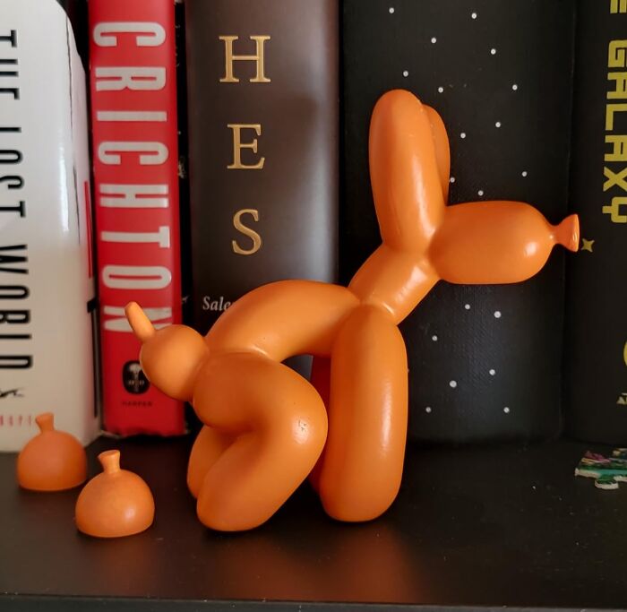 Add A Touch Of Playful Absurdity To Your Living Space With This Pooping Balloon Dog Statue