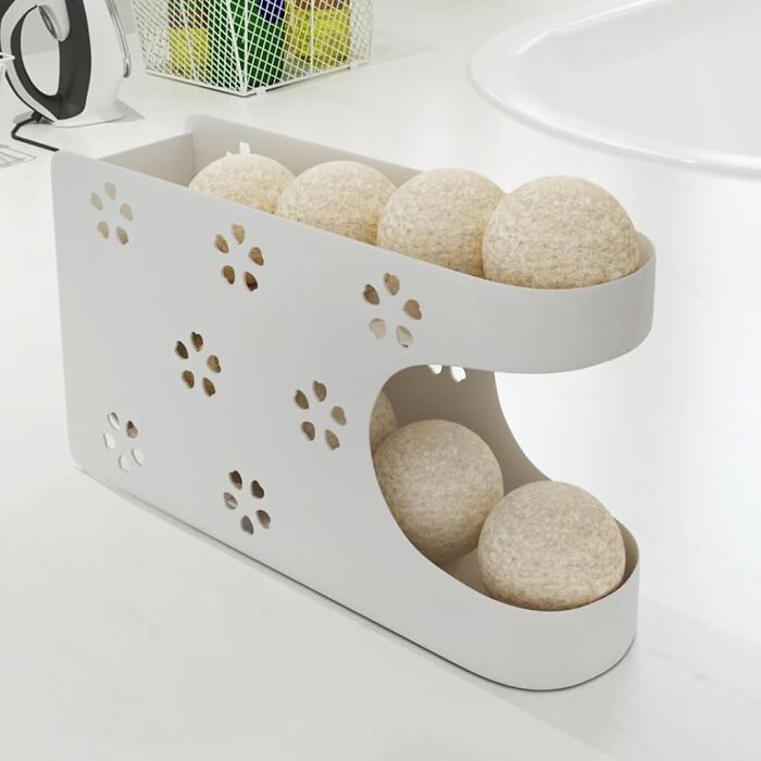 No More Dryer Ball Hide-And-Seek! This Magnetic Dryer Ball Holder Keeps Them Corralled And Ready For Action