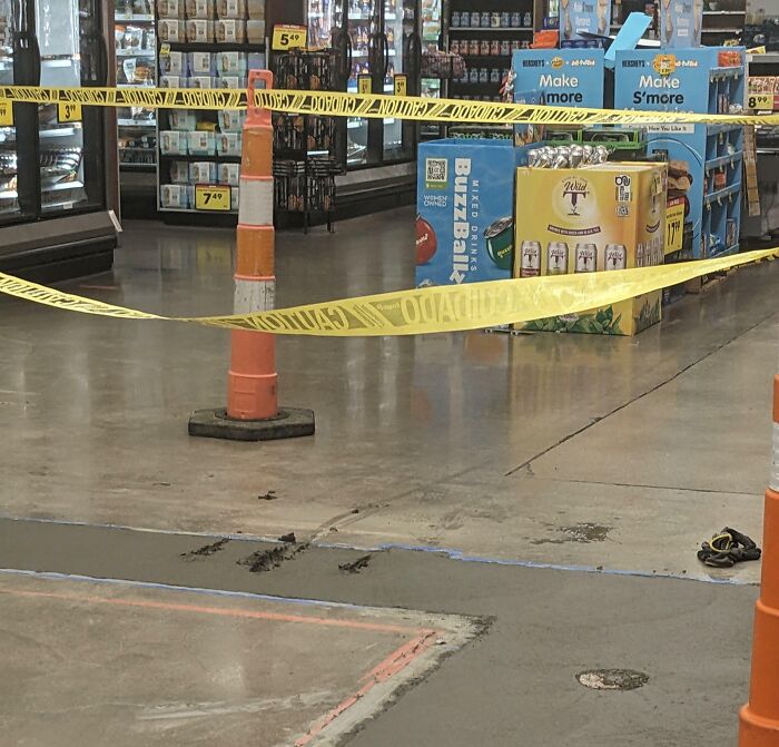 The Grocery Store Had This Caution Tape Up Because They Are Redoing The Floors And That Is Wet Cement