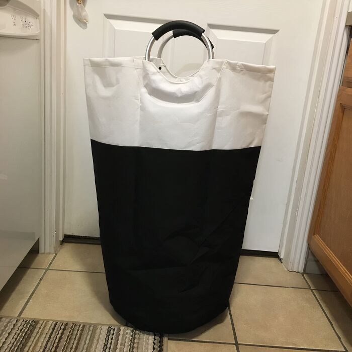 Dirty Clothes Piling Up Faster Than Your Student Loan Debt? This Collapsible Laundry Basket Is Here To Help You Keep The Chaos Contained 