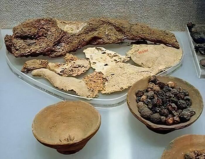 A Breakfast Prepared 3500 Years Ago Consisting Of Bread, Meat From The Leg Of A Bull, And For Dessert, A Plate Containing Figs And Dates