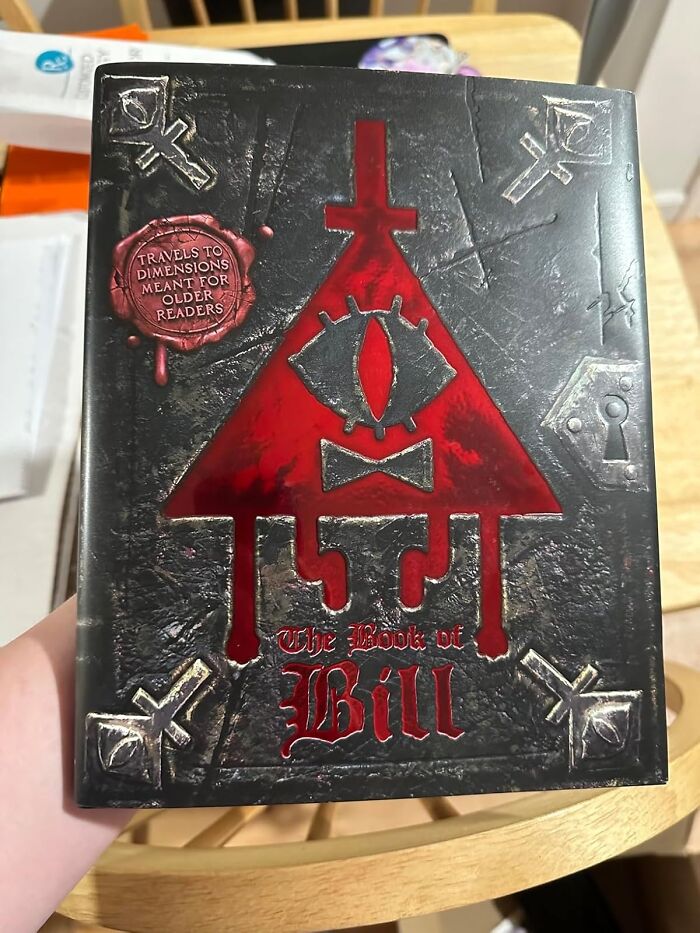  The Book Of Bill (Gravity Falls): Did You Miss Him? Admit It, You Missed Him. Bill Cipher Is Back And Ready To Spill All The Secrets Of The Universe, Including How To Take Over The World And The Proper Way To Wear A Top Hat. Just Try Not To Make A Deal With Him... Or Else!