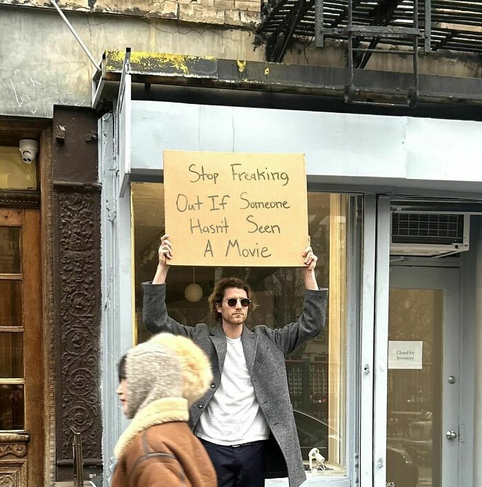 Clever-Dude-With-Sign-Annoying-Things-Protesting