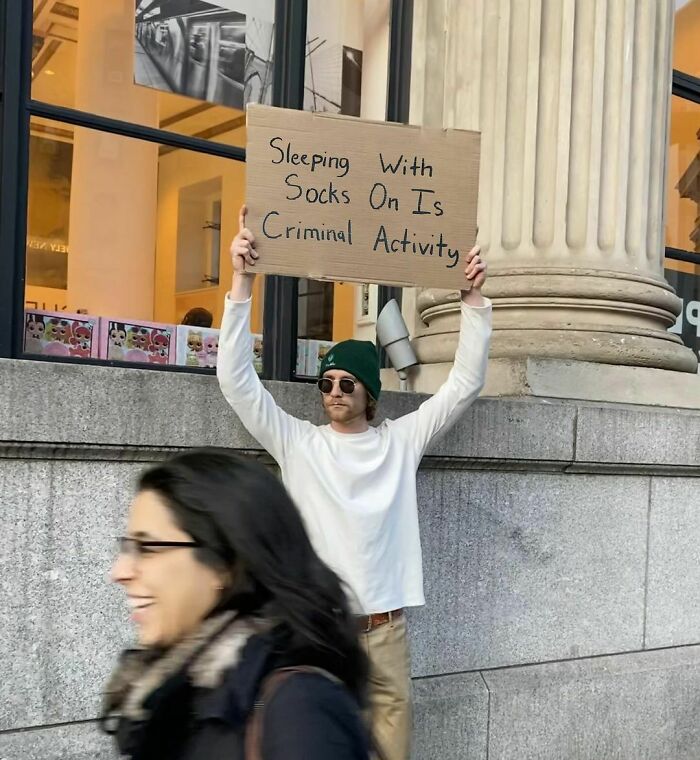 Clever-Dude-With-Sign-Annoying-Things-Protesting