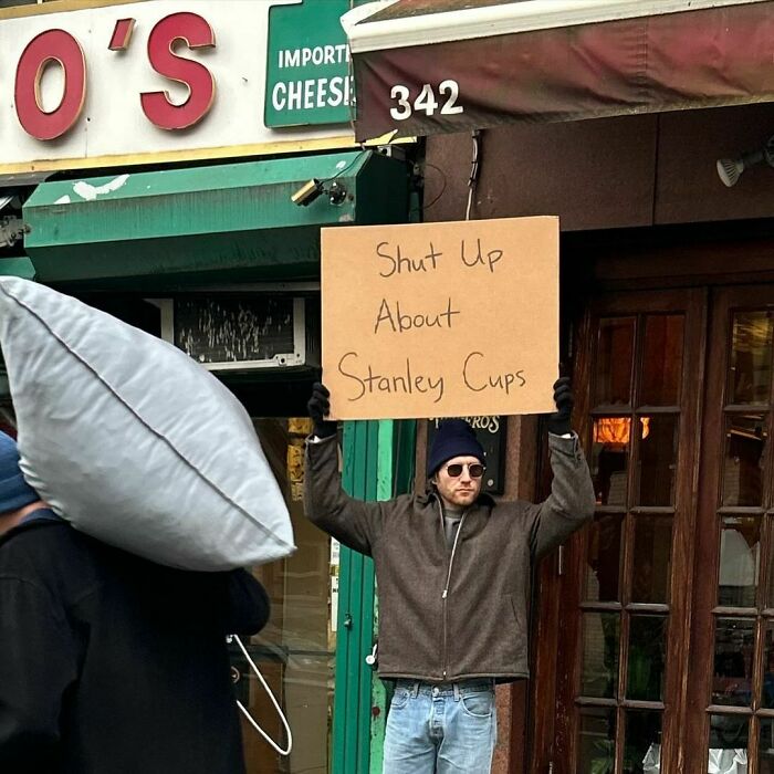 Clever-Dude-With-Sign-Annoying-Things-Protesting