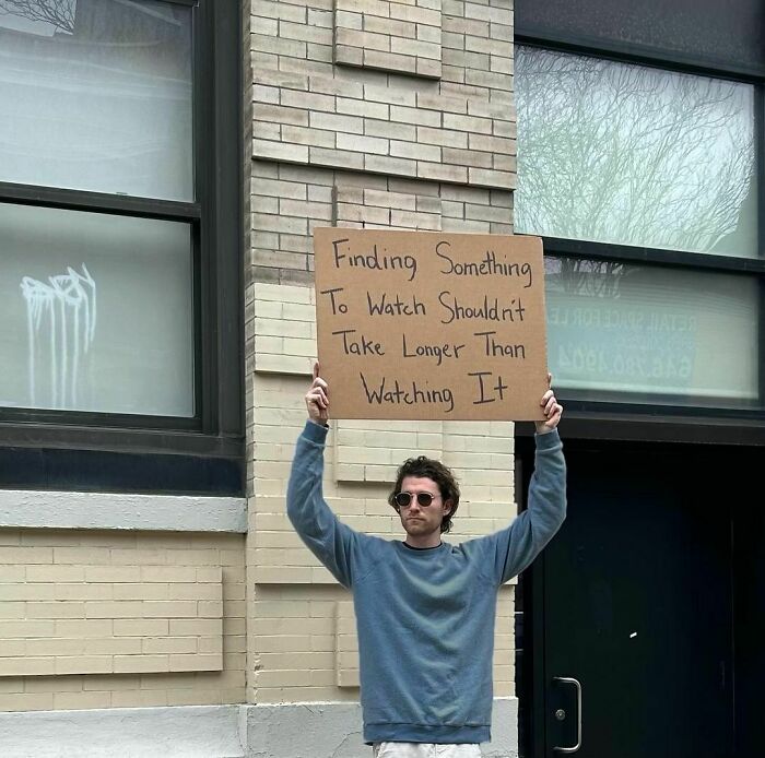 Clever-Dude-With-Sign-Annoying-Things-Protesting