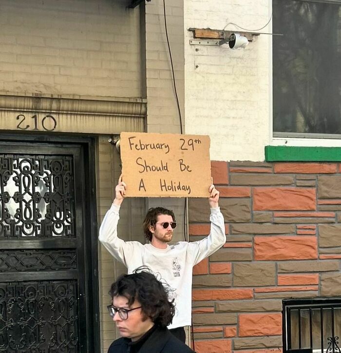 Clever-Dude-With-Sign-Annoying-Things-Protesting