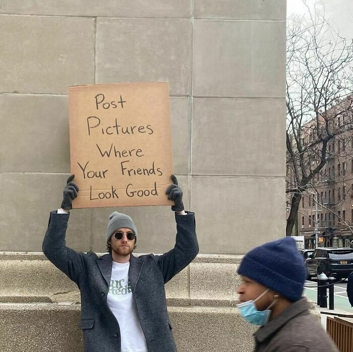 Clever-Dude-With-Sign-Annoying-Things-Protesting