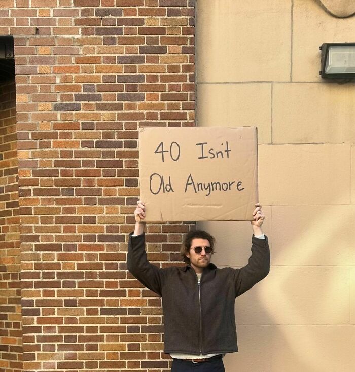 Clever-Dude-With-Sign-Annoying-Things-Protesting