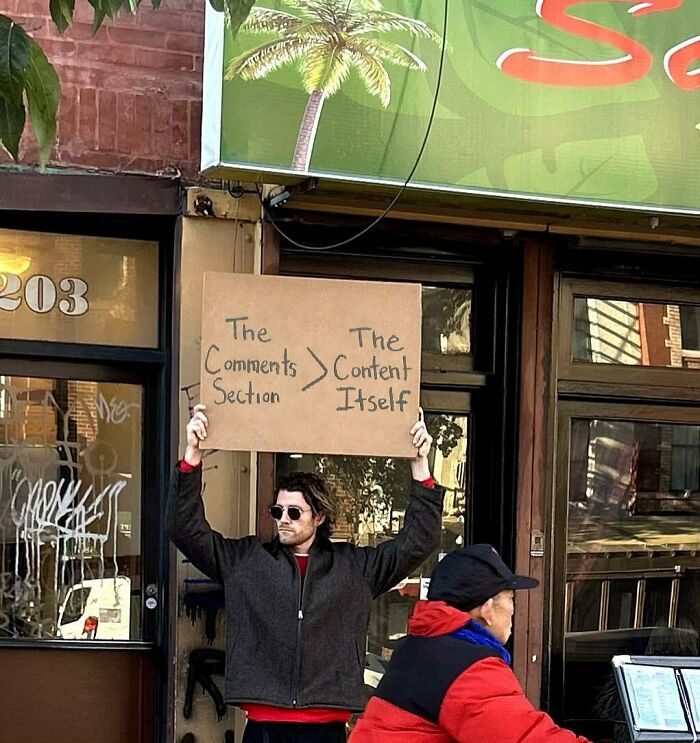 Clever-Dude-With-Sign-Annoying-Things-Protesting