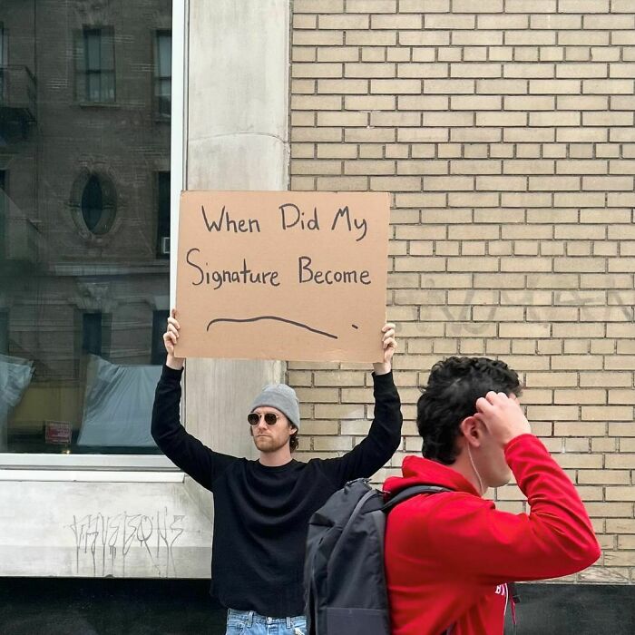 Clever-Dude-With-Sign-Annoying-Things-Protesting