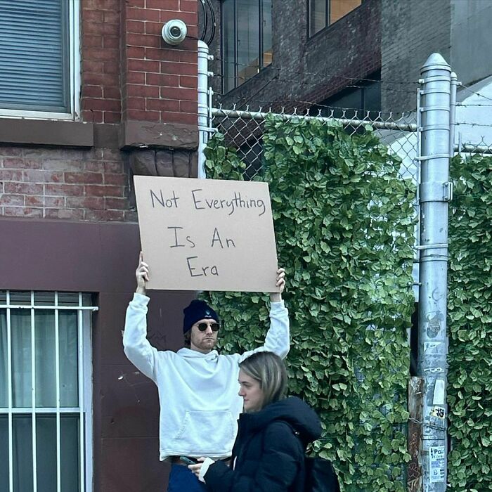 Clever-Dude-With-Sign-Annoying-Things-Protesting