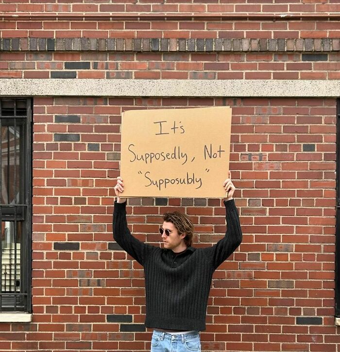 Clever-Dude-With-Sign-Annoying-Things-Protesting