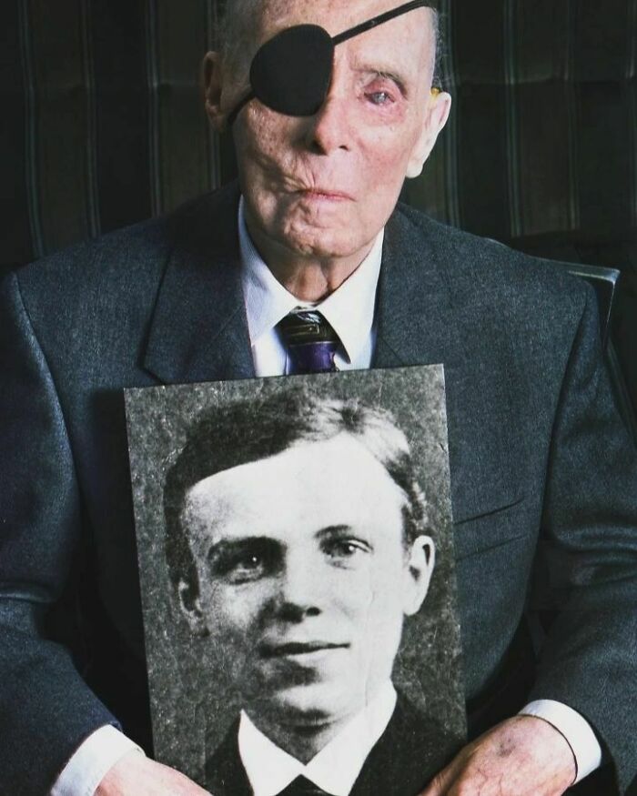 German First World War Veteran Hans Lange With A Portrait Of Himself As A 19-Year-Old In 1918. Photograph Taken In 1998