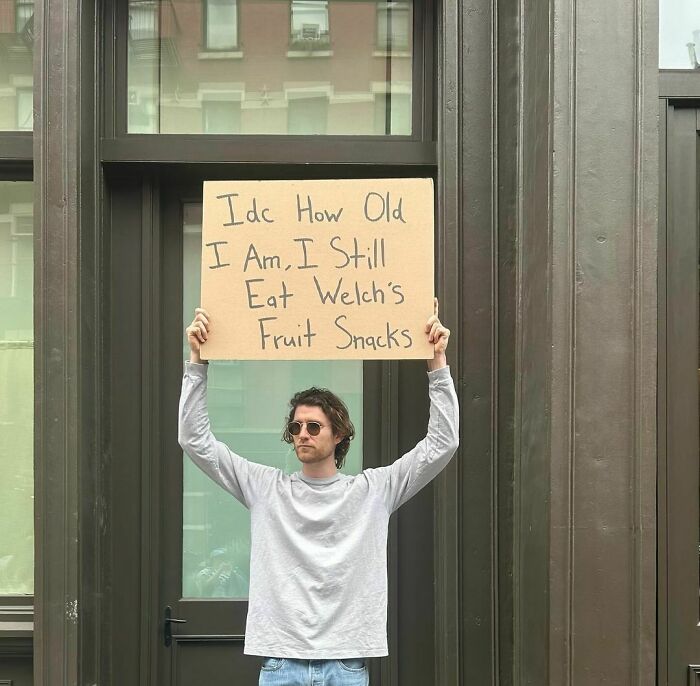 Clever-Dude-With-Sign-Annoying-Things-Protesting