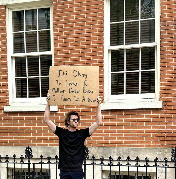 Clever-Dude-With-Sign-Annoying-Things-Protesting