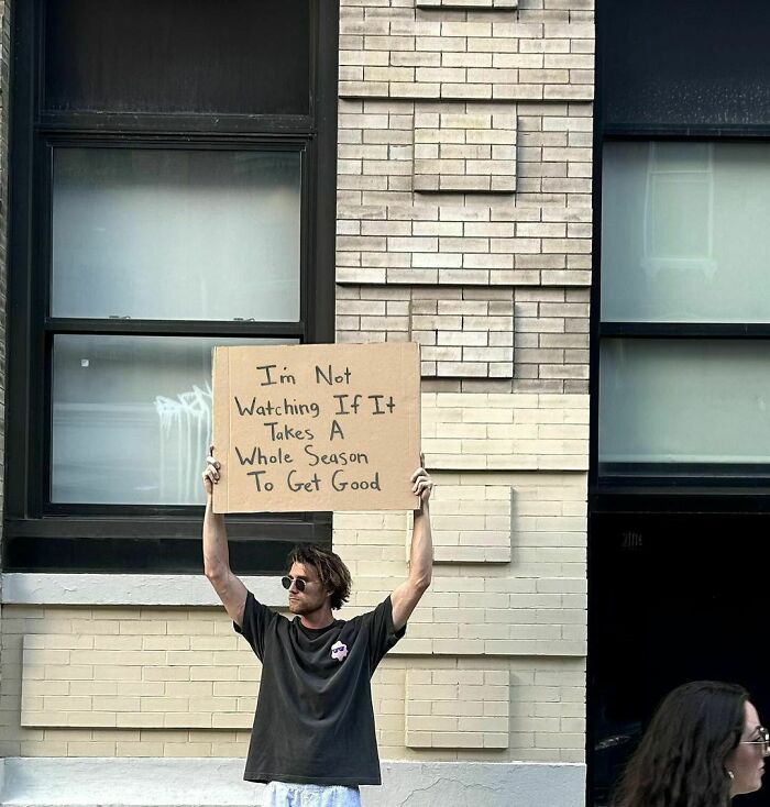 Clever-Dude-With-Sign-Annoying-Things-Protesting