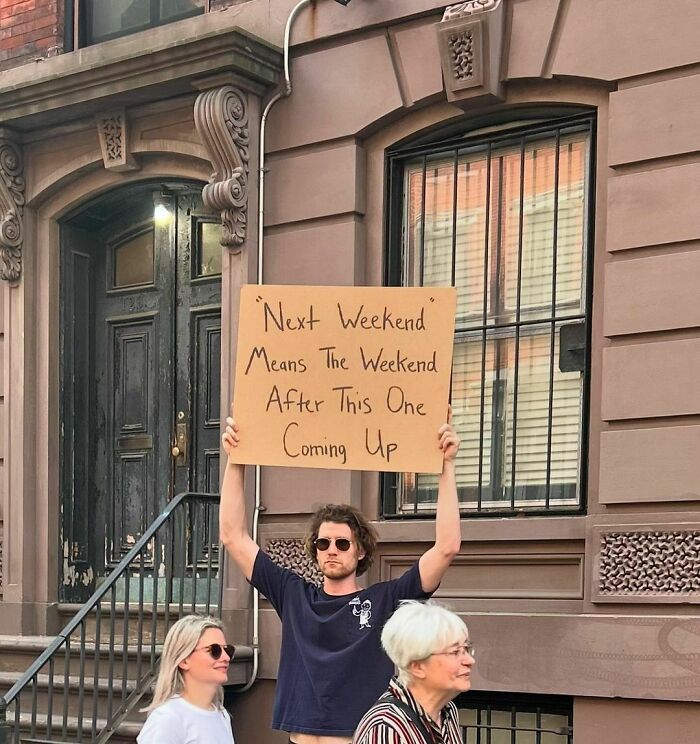 Clever-Dude-With-Sign-Annoying-Things-Protesting