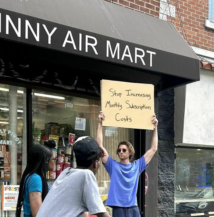 Clever-Dude-With-Sign-Annoying-Things-Protesting