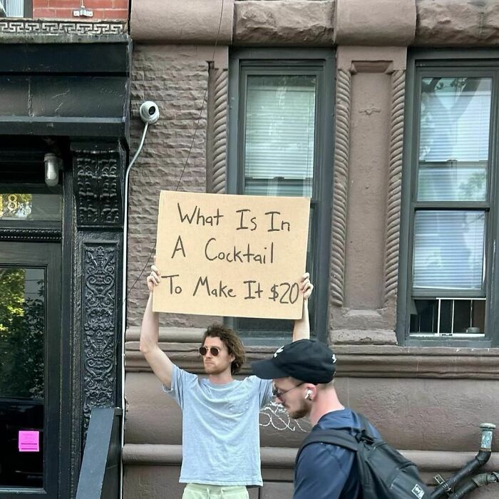 Clever-Dude-With-Sign-Annoying-Things-Protesting