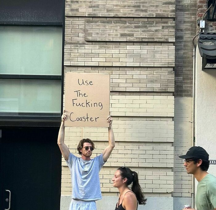 Clever-Dude-With-Sign-Annoying-Things-Protesting