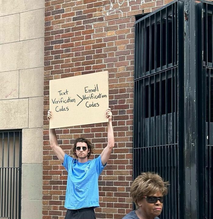 Clever-Dude-With-Sign-Annoying-Things-Protesting