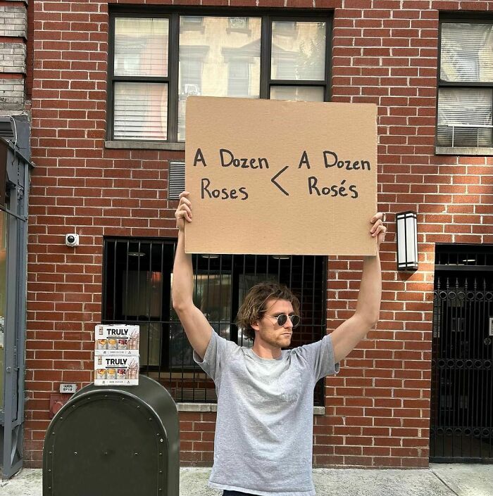 Clever-Dude-With-Sign-Annoying-Things-Protesting