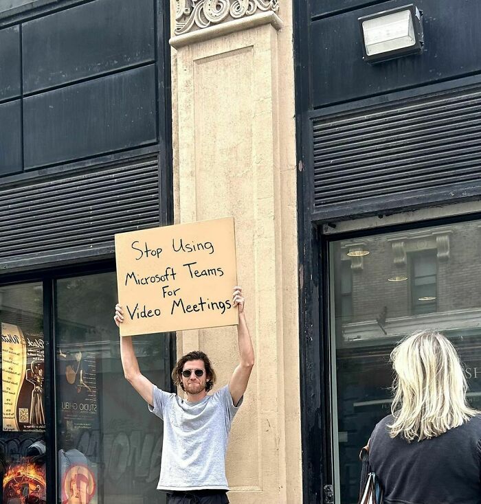 Clever-Dude-With-Sign-Annoying-Things-Protesting