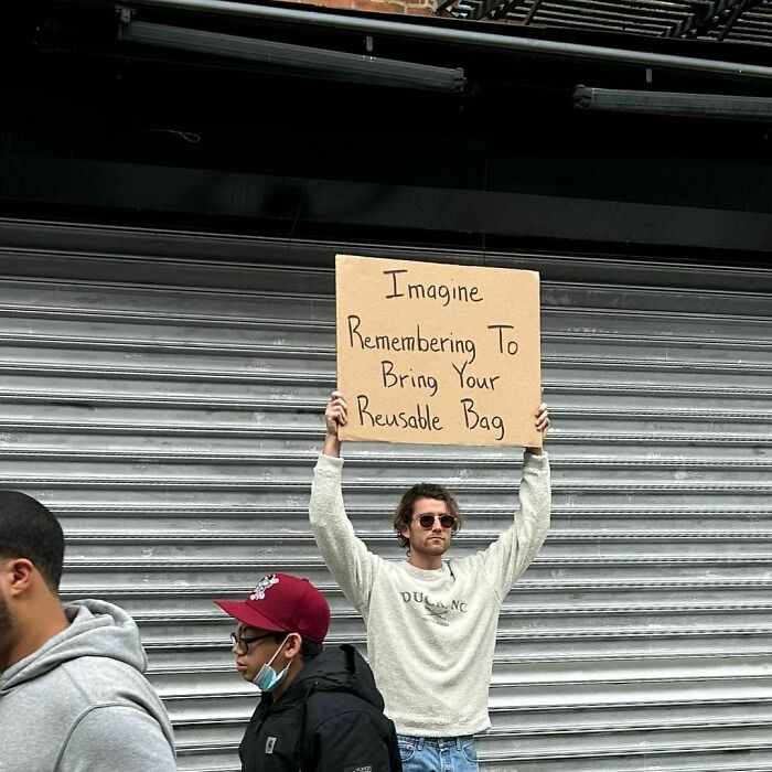 Clever-Dude-With-Sign-Annoying-Things-Protesting