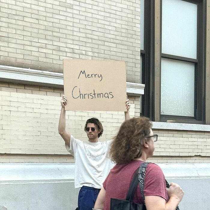 Clever-Dude-With-Sign-Annoying-Things-Protesting