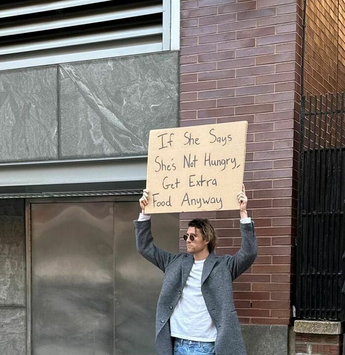 Clever-Dude-With-Sign-Annoying-Things-Protesting