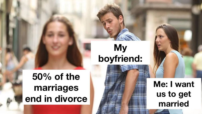 A love meme featuring the "distracted boyfriend" format. The boyfriend, labeled "My boyfriend," is looking at another woman who is labeled "50% of the marriages end in divorce." His girlfriend, labeled "Me: I want us to get married," looks at him in disbelief and annoyance. The scene is set on a city street with blurred background pedestrians.