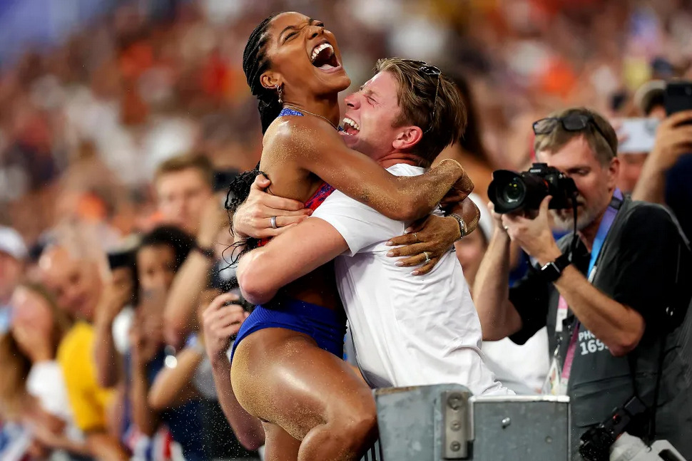 Tara Davis-Woodhall’s Emotional Leap Into Husband’s Arms After Gold Win ...