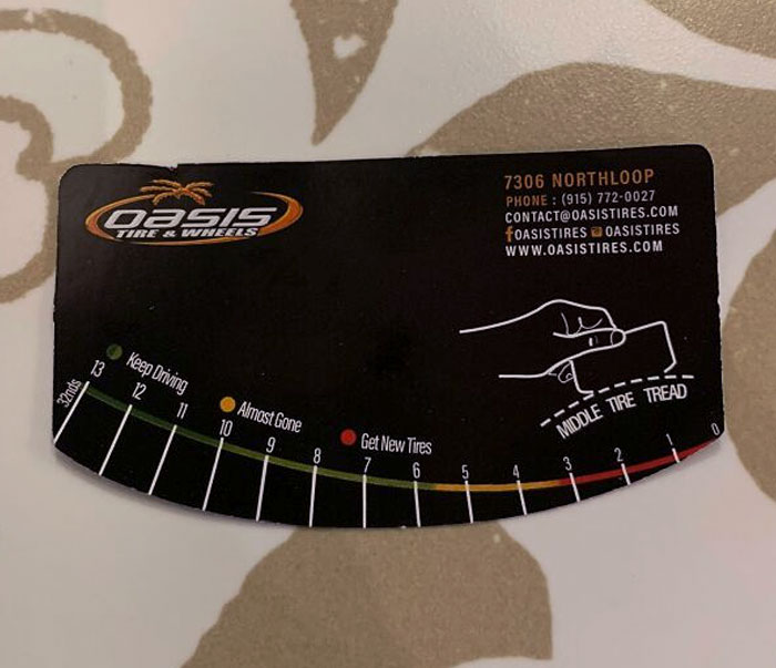 This Business Card From A Tire Place Also Serves As A Tire Thread Measurement Tool