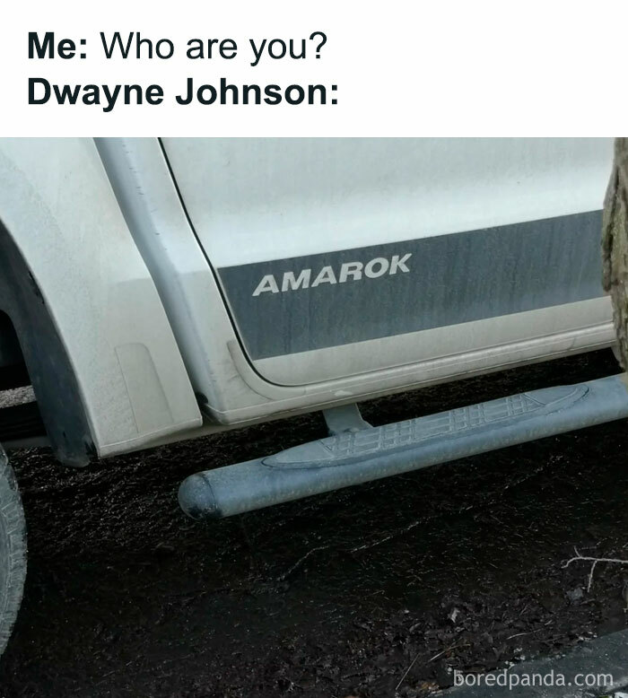 A The Rock meme featuring the side of a white vehicle with the word "AMAROK" printed on the door. The text above reads, "Me: Who are you? Dwayne Johnson:" humorously implying that The Rock's response would be "Amarok," playing on the name similarity with his own moniker. The joke creatively uses the car model name to create a playful interaction, emphasizing the wordplay between “Amarok” and “The Rock.”