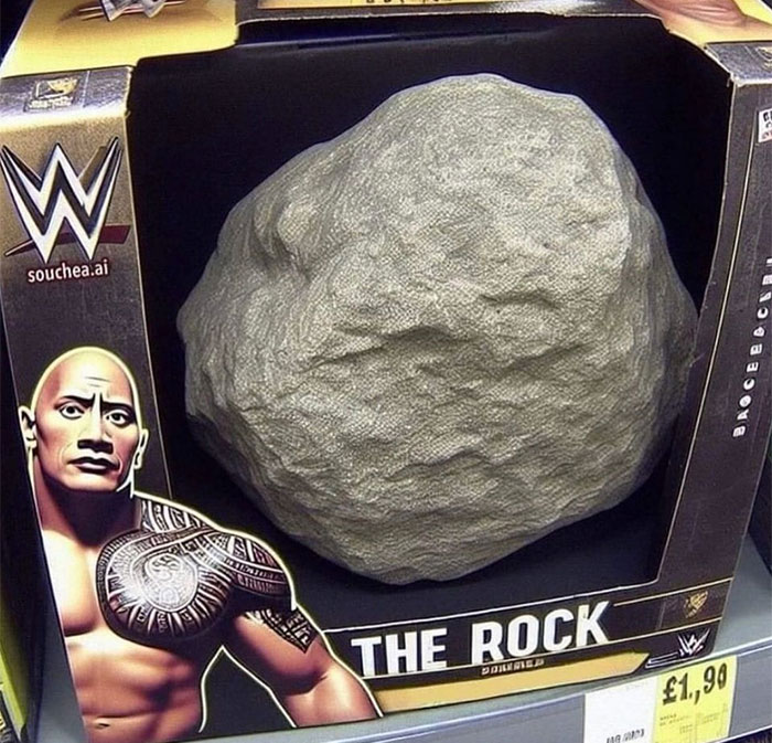 A The Rock meme showing a toy package labeled "The Rock" from WWE, featuring a realistic-looking rock inside the packaging. The box has a graphic of Dwayne "The Rock" Johnson with his signature tattoos and a serious expression, humorously implying that the toy is literally a rock, playing on his nickname. The price tag shows £1.99, adding to the comedic effect of the simple yet absurd toy concept.