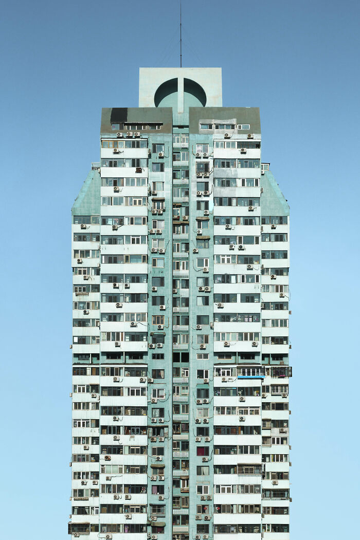 High-rise building against clear blue sky showcasing future of photography.