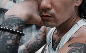 Tattooed People In Namba In Japan