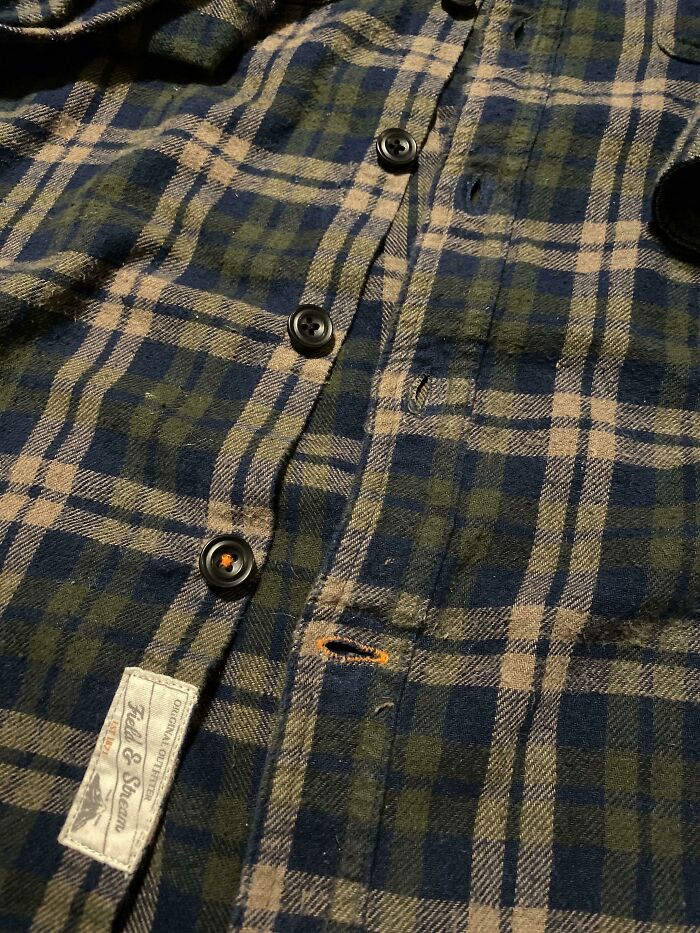 This Flannel Button Up Has An Orange Thread On The Bottom Button Hole So That You Don’t Misalign The Buttons