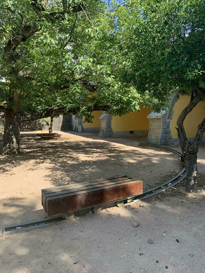 They Put Rails Under The Benches In This Park So You Can Always Be In The Shadow