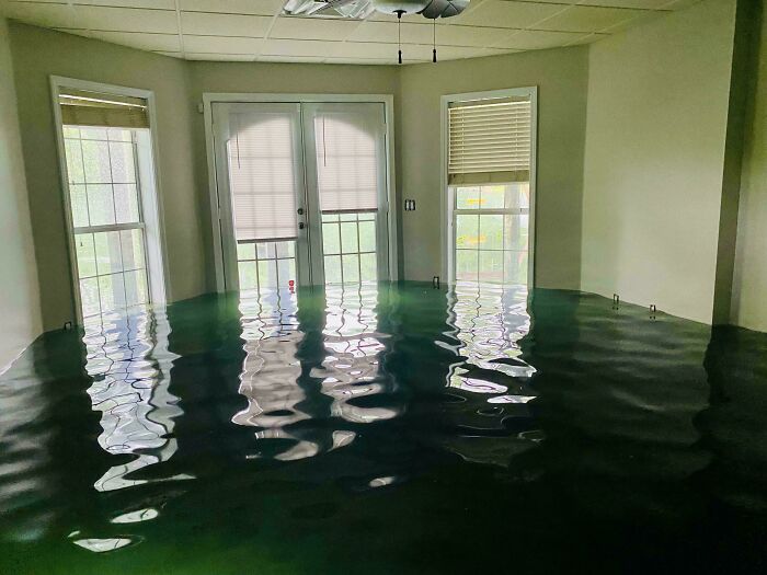 My Mother-In-Law’s House Flooded Last Night. Took This Pic Before We Started Pumping Water Out, Thought It Looked Surreal