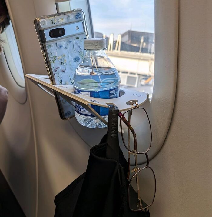 Upgrade Your In-Flight Experience With This Airplane Window Organization Station – It's Like Having Your Own Personal Assistant At 30,000 Feet!